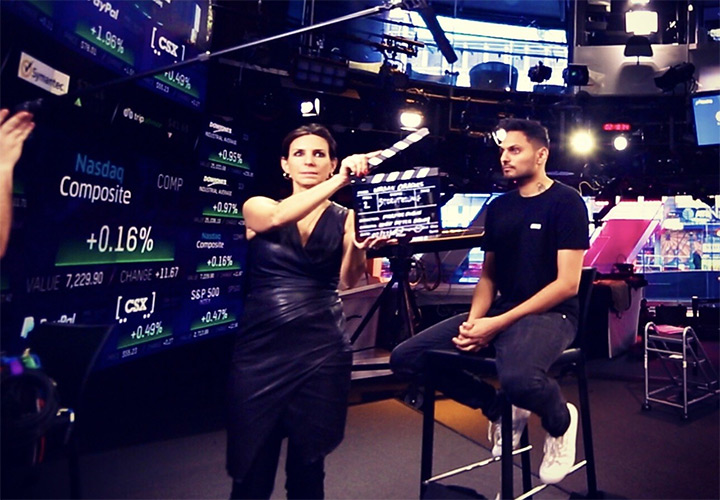 Jay Shetty and Martine Dubin with the CORE crew filming at Nasdaq Marketsite on Times Square in New York City.