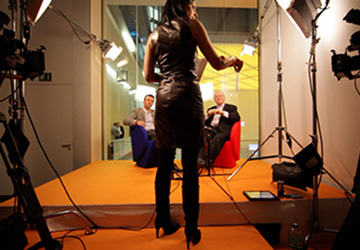 Matthew Bishop, Alejandro Ramirez and Martine getting ready to shoot an episode of Philanthrocapitalism at our DLD2010 studio in Munich, Germany.